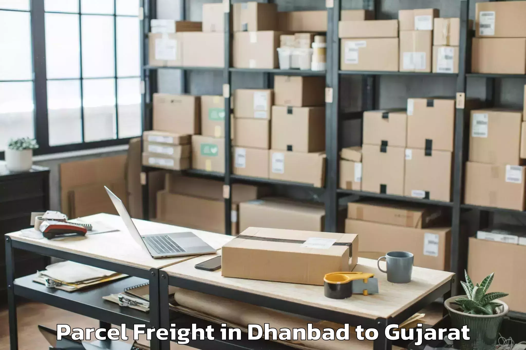 Top Dhanbad to Dhuvaran Parcel Freight Available